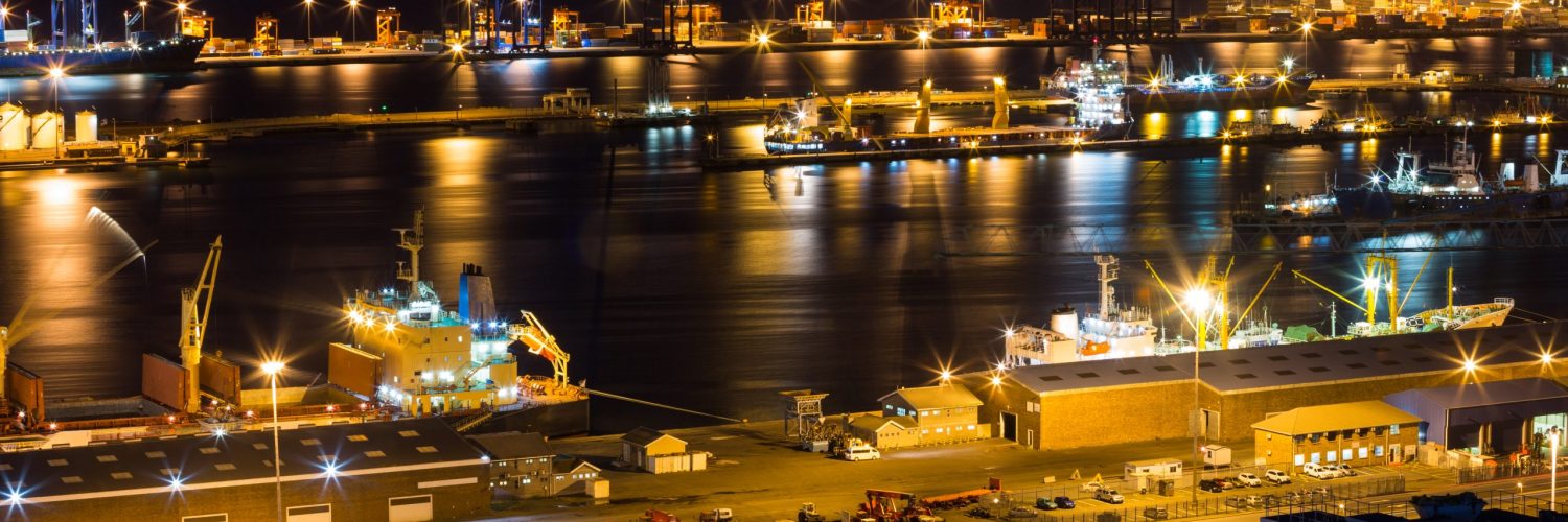Aerial view of illuminated business district at night